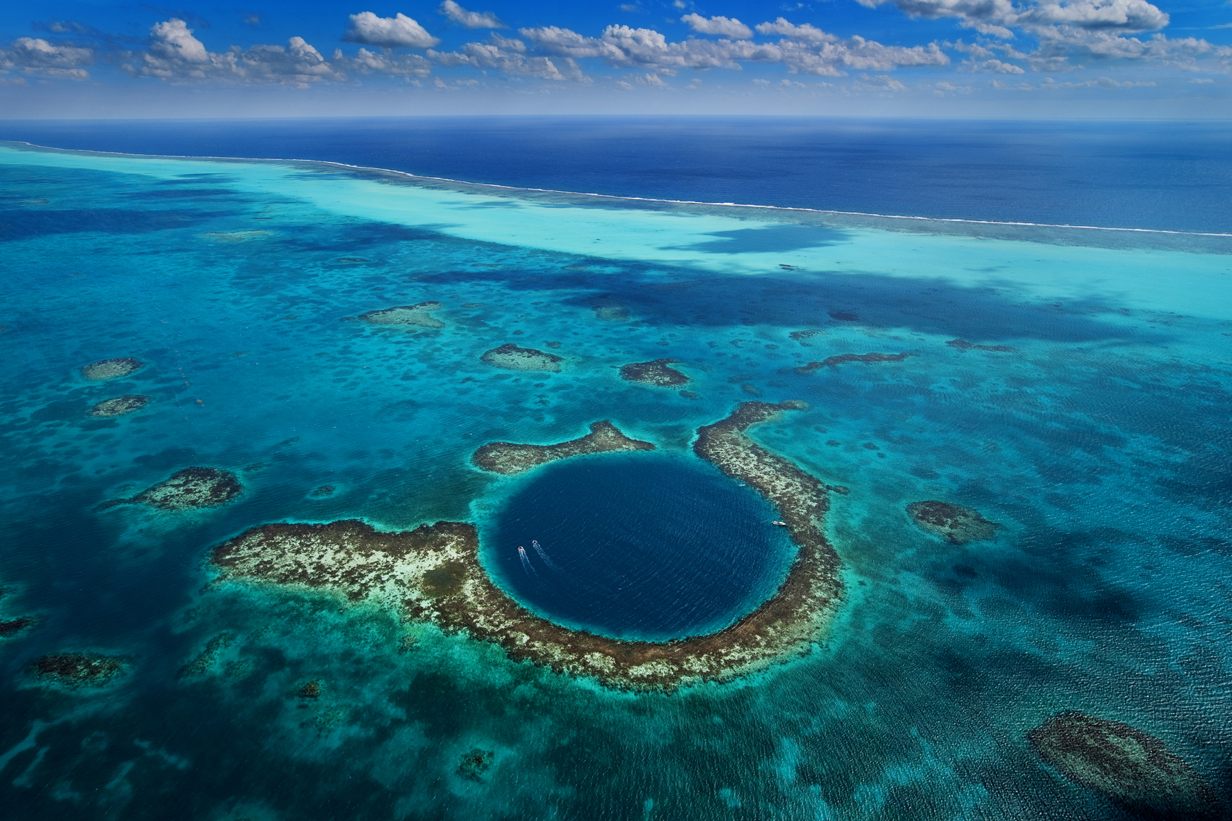 Taking a Scenic Flight Over the Great Blue Hole of Belize